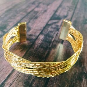 Goldtone modern braided wire cuff bracelet